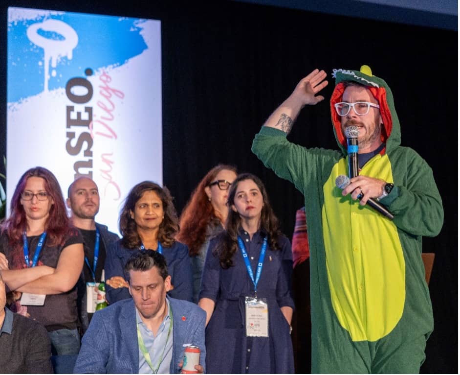 Kevin Newman dressed as an alligator at BrightonSEO San Diego